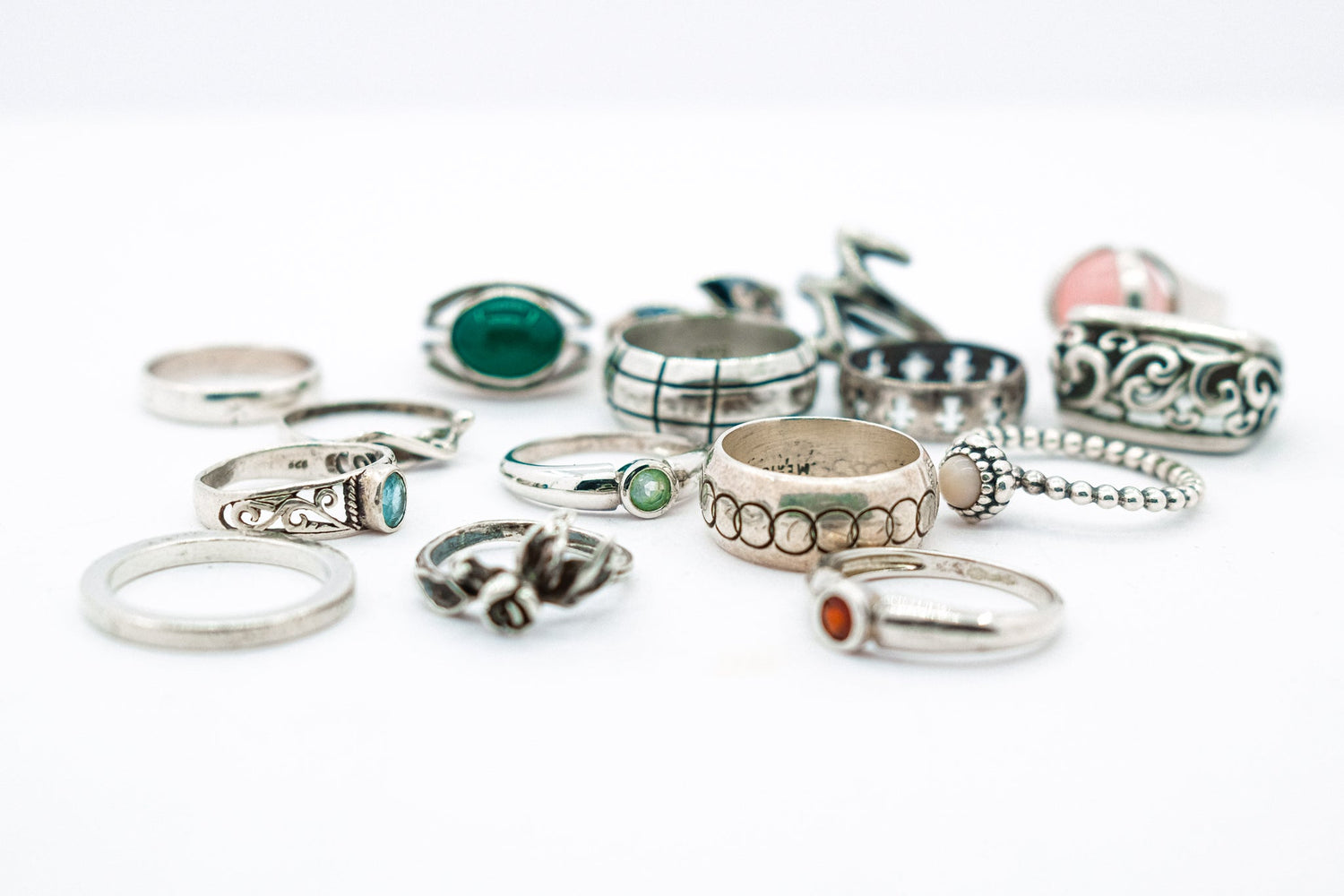 a collection of vintage silver rings