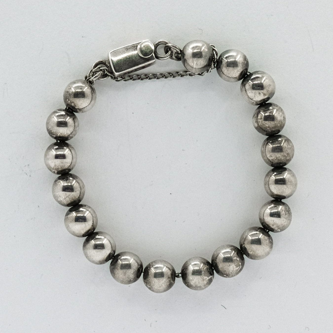 beaded rosery 8 inch bracelet with safety chain P47.N61.